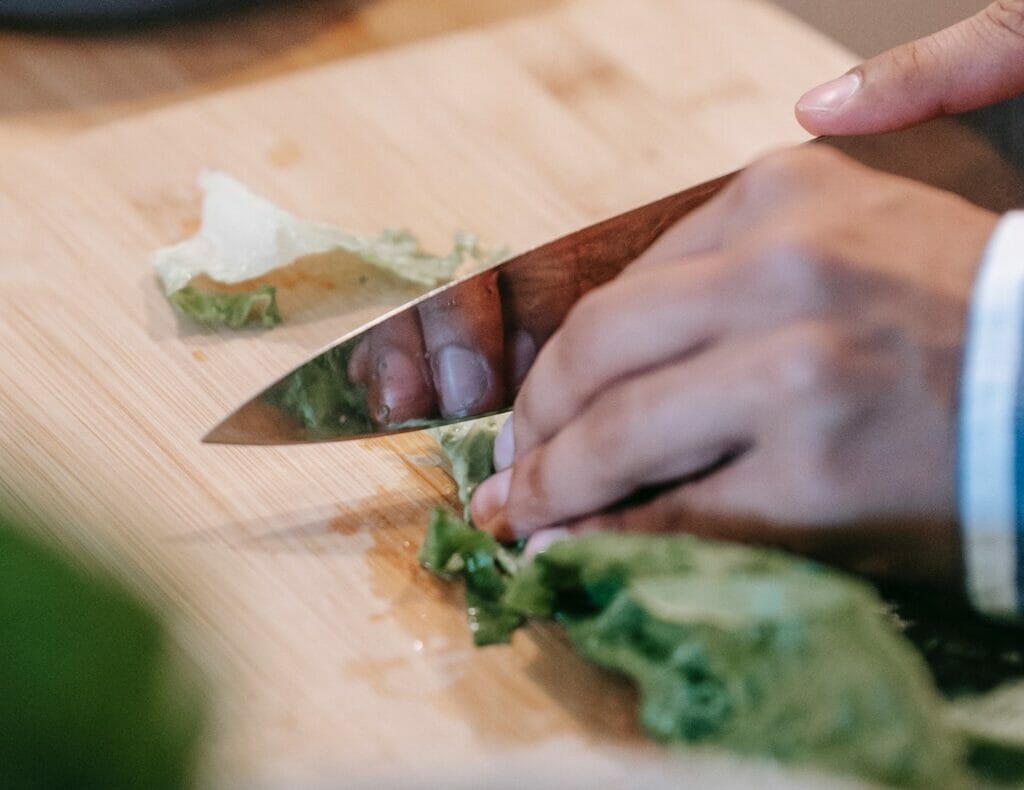 Chiffonade salad cut. Knife cutting techniques.