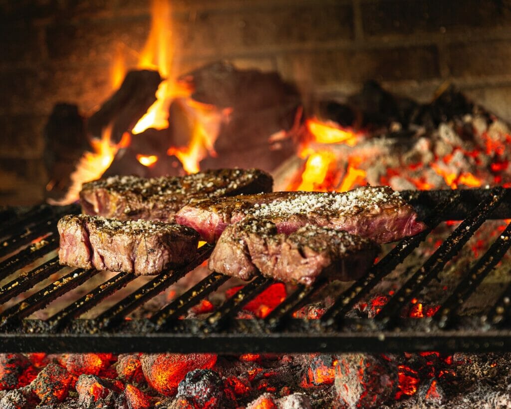 grilling cooking method steaks on open fire